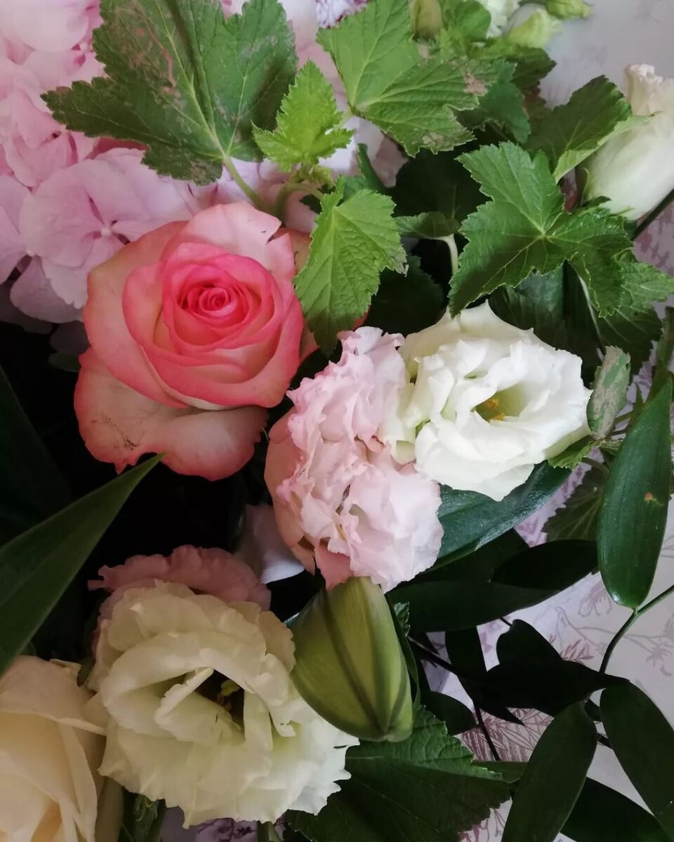 Bouquet of pink roses, lisianthus and hydrangeas